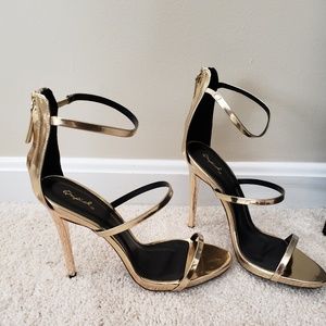 Strappy gold high heel sandals